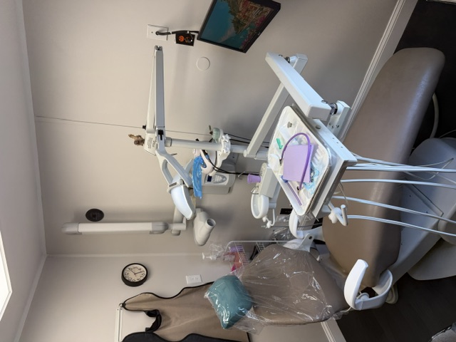 Hygiene room at Design That Smile, viewed toward the treatment chair